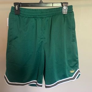 Green adidas basketball shorts